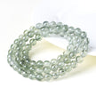 Natural Ice Green Rutilated Quartz Buddha Bead Bracelet