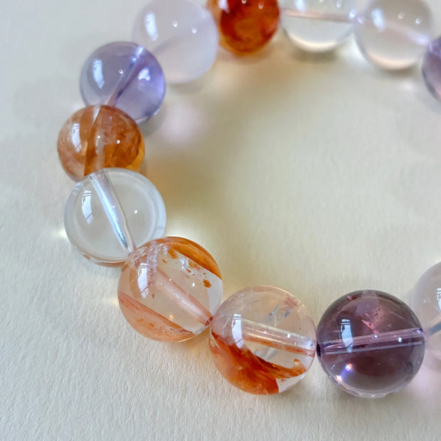 Tri Color Radiance Bracelet detail Brazilian Amethyst Rose Quartz Golden Healer chakra beads close-up view