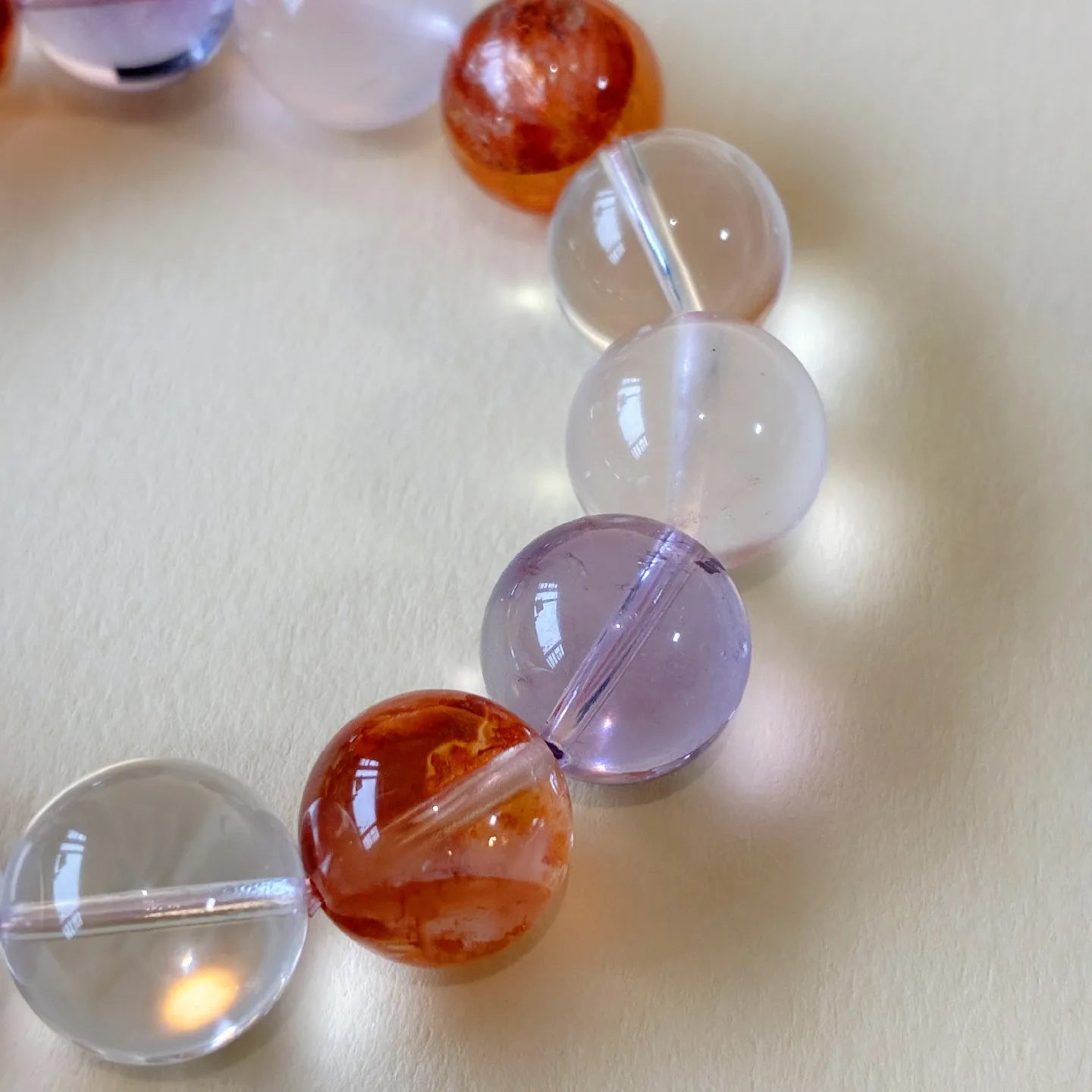 Tri Color Radiance Chakra Bracelet worn on wrist Brazilian Amethyst Rose Quartz Golden Healer crystal beaded bracelet