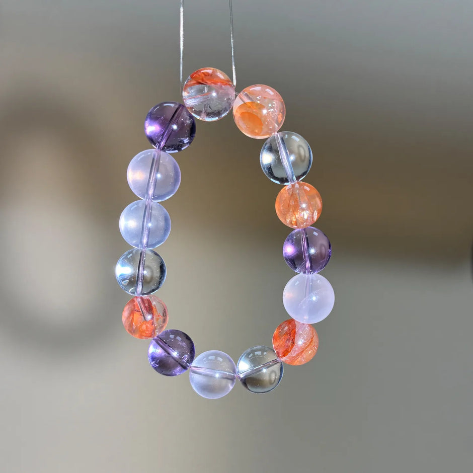 Tri Color Radiance Chakra Bracelet side view Brazilian Amethyst Rose Quartz Golden Healer crystal beads